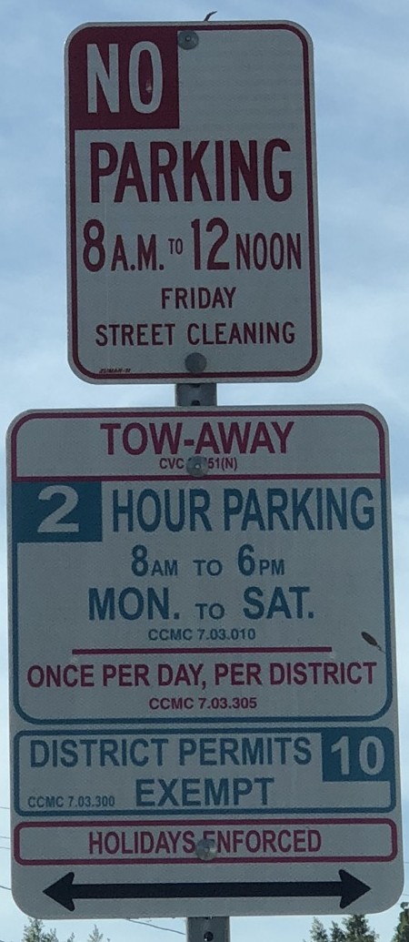 No parking 8 AM–12 noon Friday. Street cleaning. Tow-away. 2 hour parking 8 AM–6 PM, Monday–Saturday. Once per day, per district. District permits 10 exempt. Holidays enforced. Arrows point both ways.